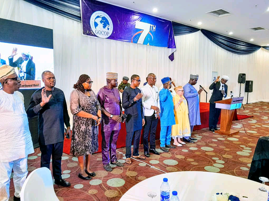 Adeola Yusuf (4th from left) with Peter Oluka (2nd left): Bisi Deji-Folutile (3rd left), and others during their induction into GOCOP in Abuja on Thursday, October 5, 2023